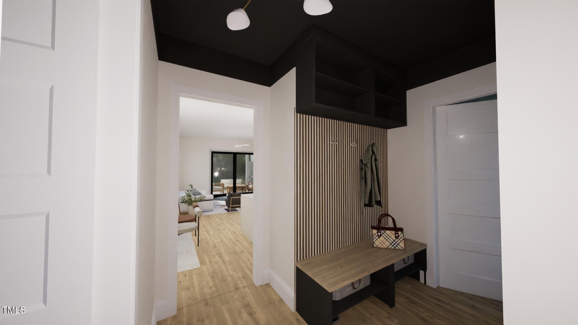 1806 Pershing Road Raleigh, NC 27608 - Photo 9 of 36 hallway with wooden floor and furniture