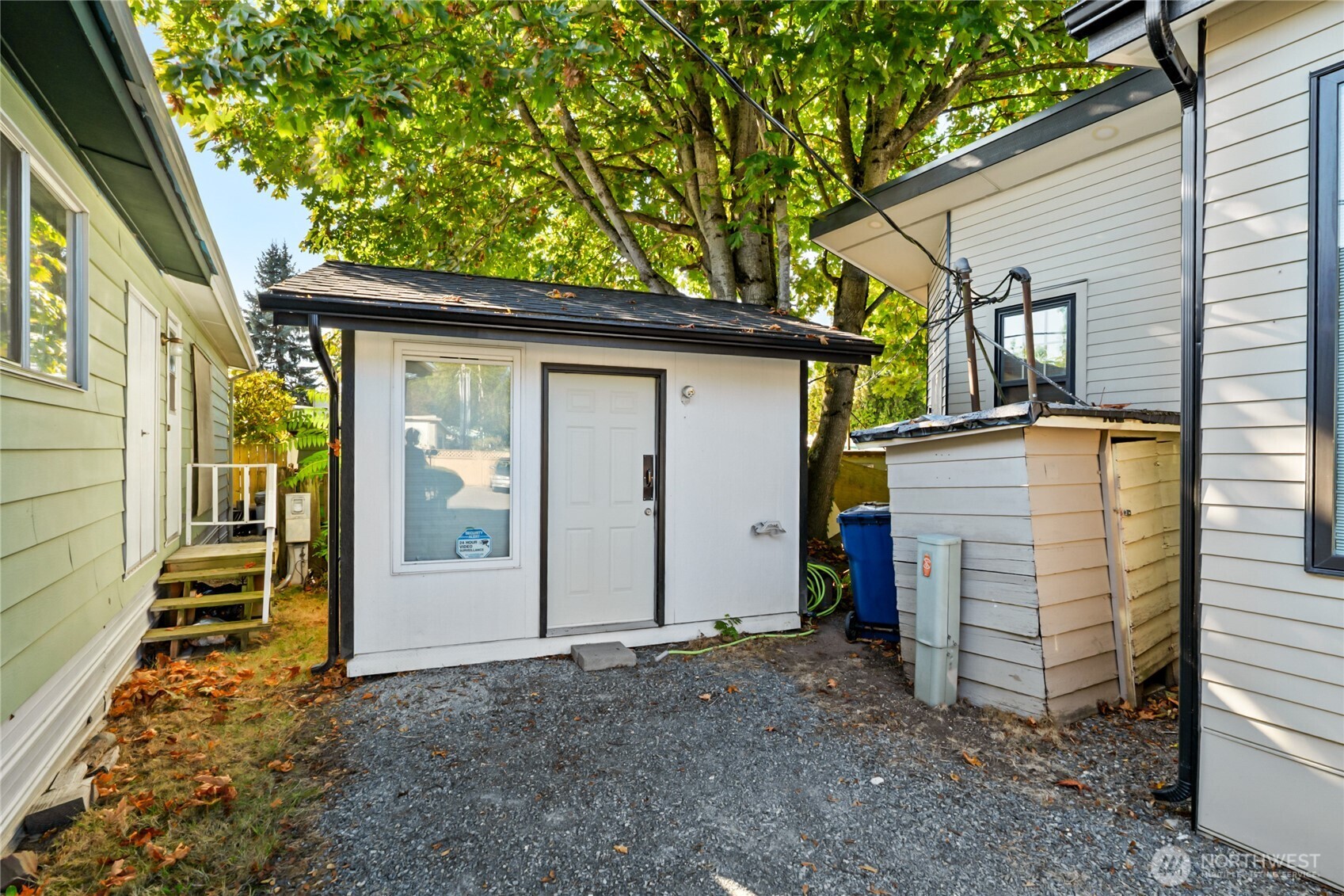 1645 South 272nd Street, Unit 55 Federal Way, WA 98003 - Photo 20 of 27 a view of a house with a yard
