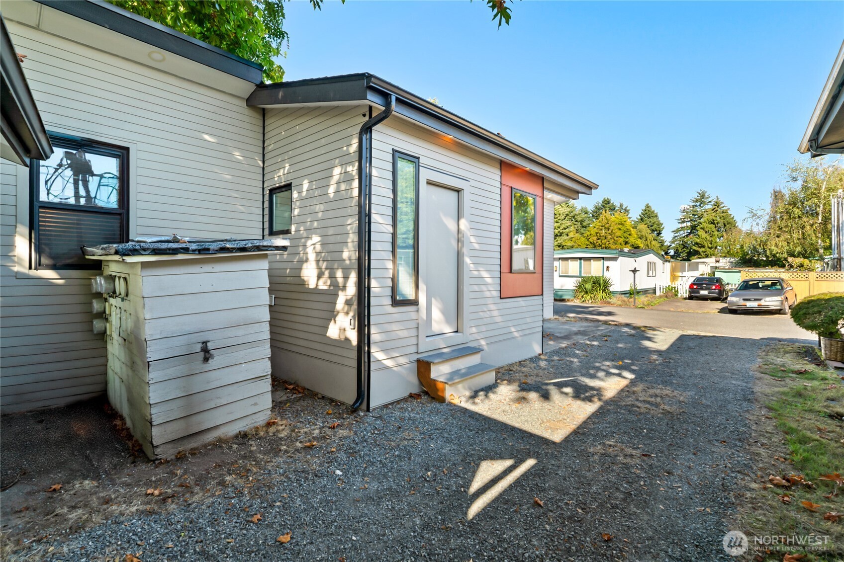 1645 South 272nd Street, Unit 55 Federal Way, WA 98003 - Photo 21 of 27 a front view of a house with a yard
