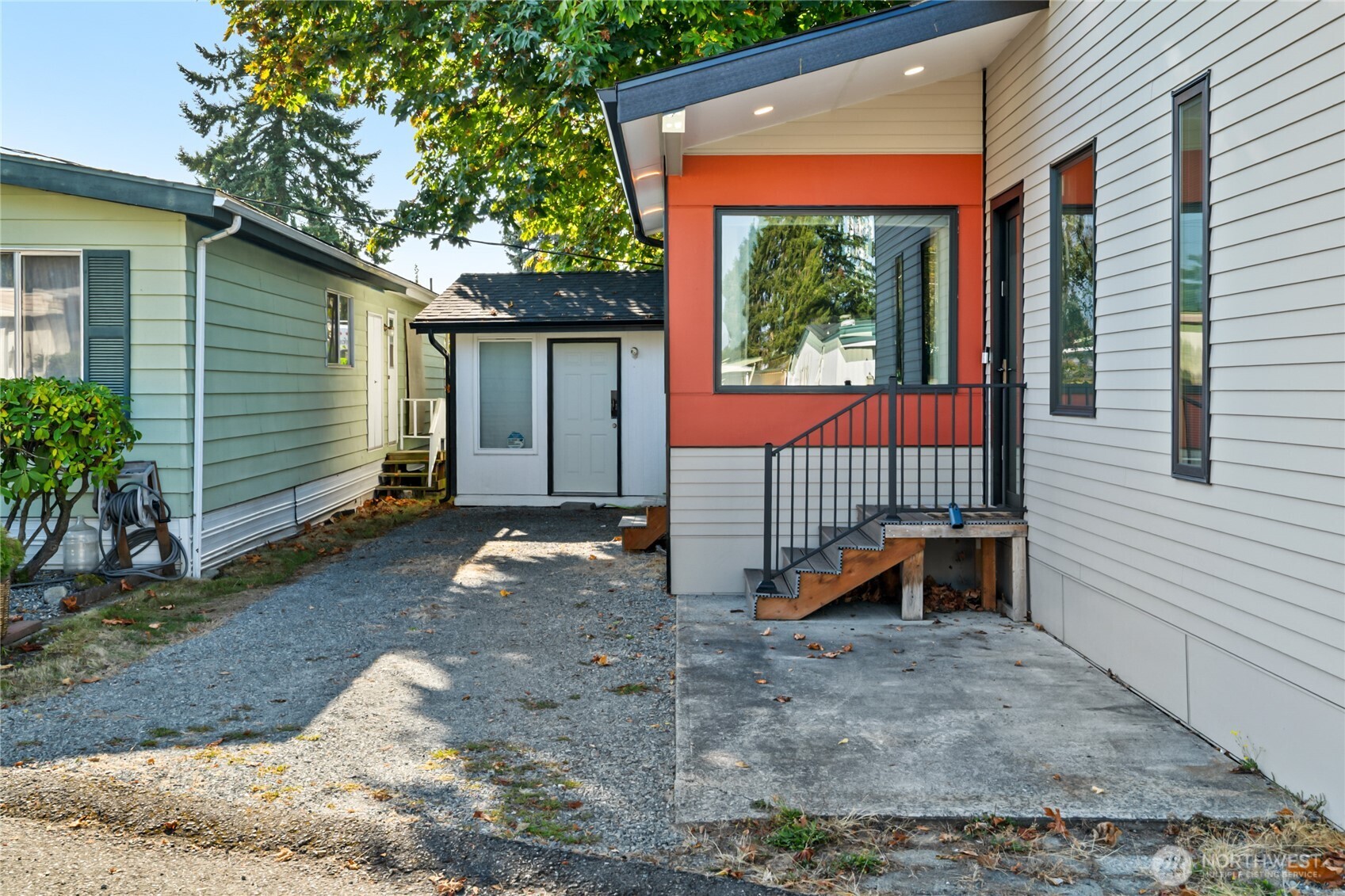 1645 South 272nd Street, Unit 55 Federal Way, WA 98003 - Photo 22 of 27 a view of a house with backyard and sitting area