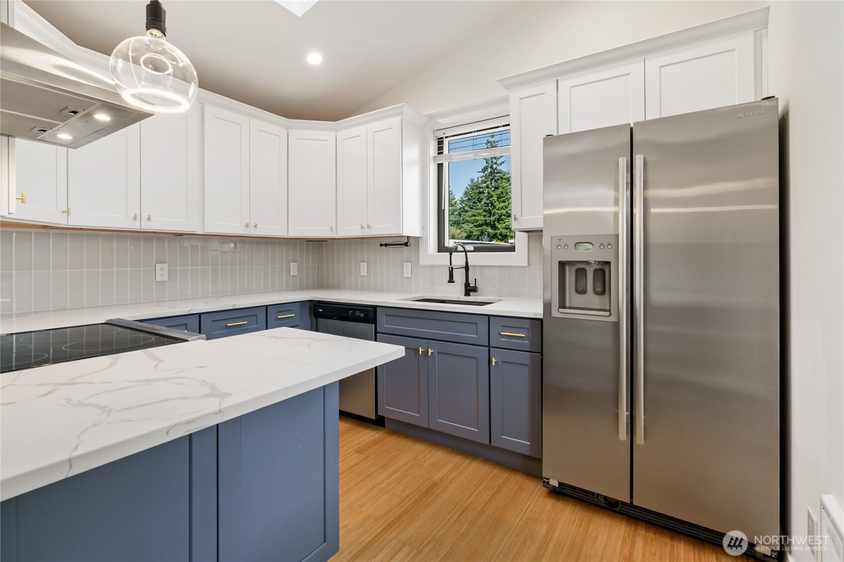1645 South 272nd Street, Unit 55 Federal Way, WA 98003 - Photo 8 of 27 a kitchen with a refrigerator a sink and cabinets
