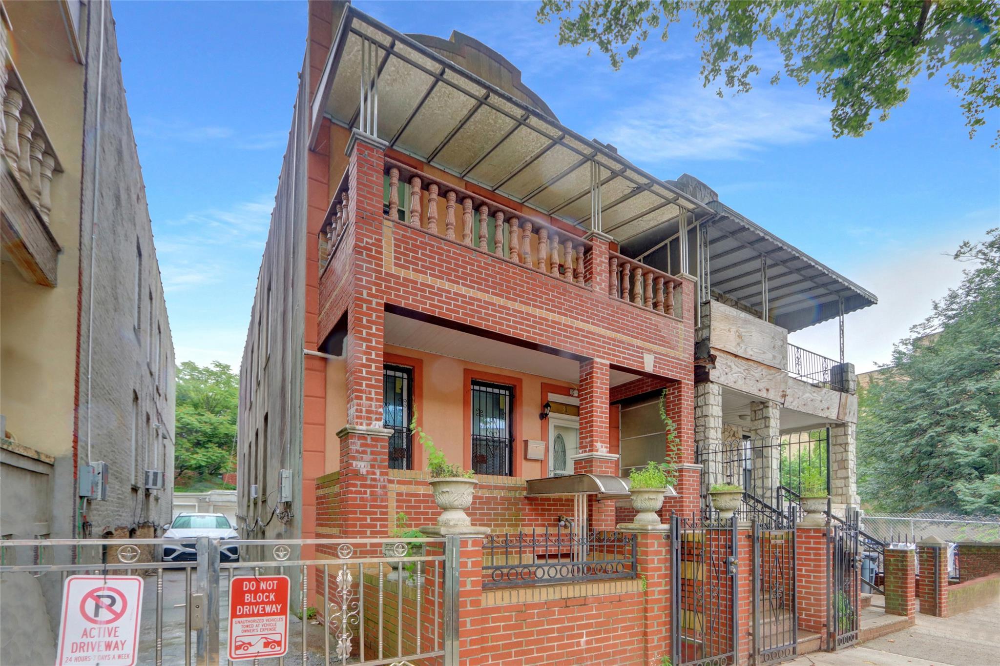 View of front facade featuring brick siding