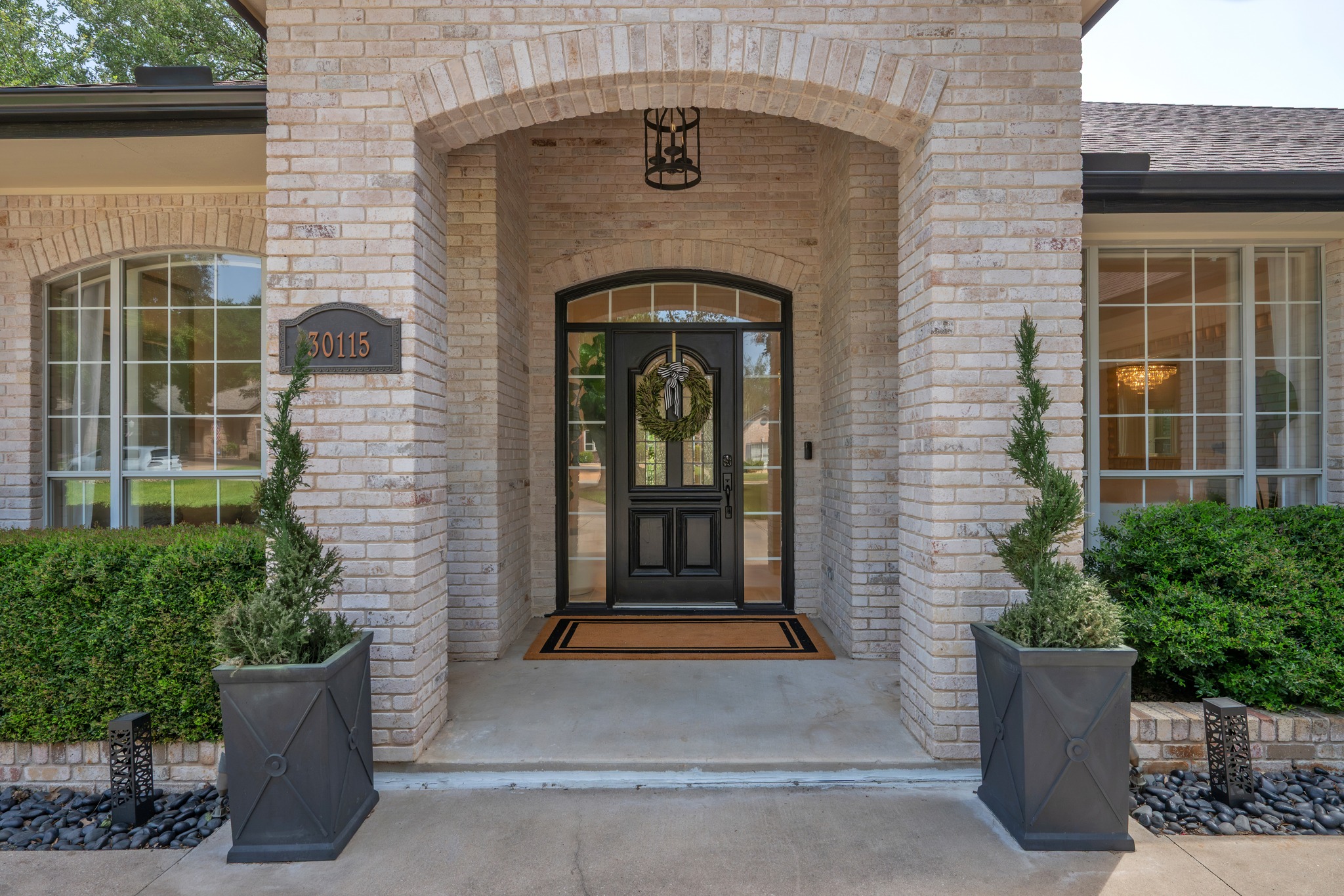 30115 Sawgrass Trail Georgetown, TX 78628 - Photo 24 of 37 An inviting brick facade with an arched entryway welcomes all to this charming residence.