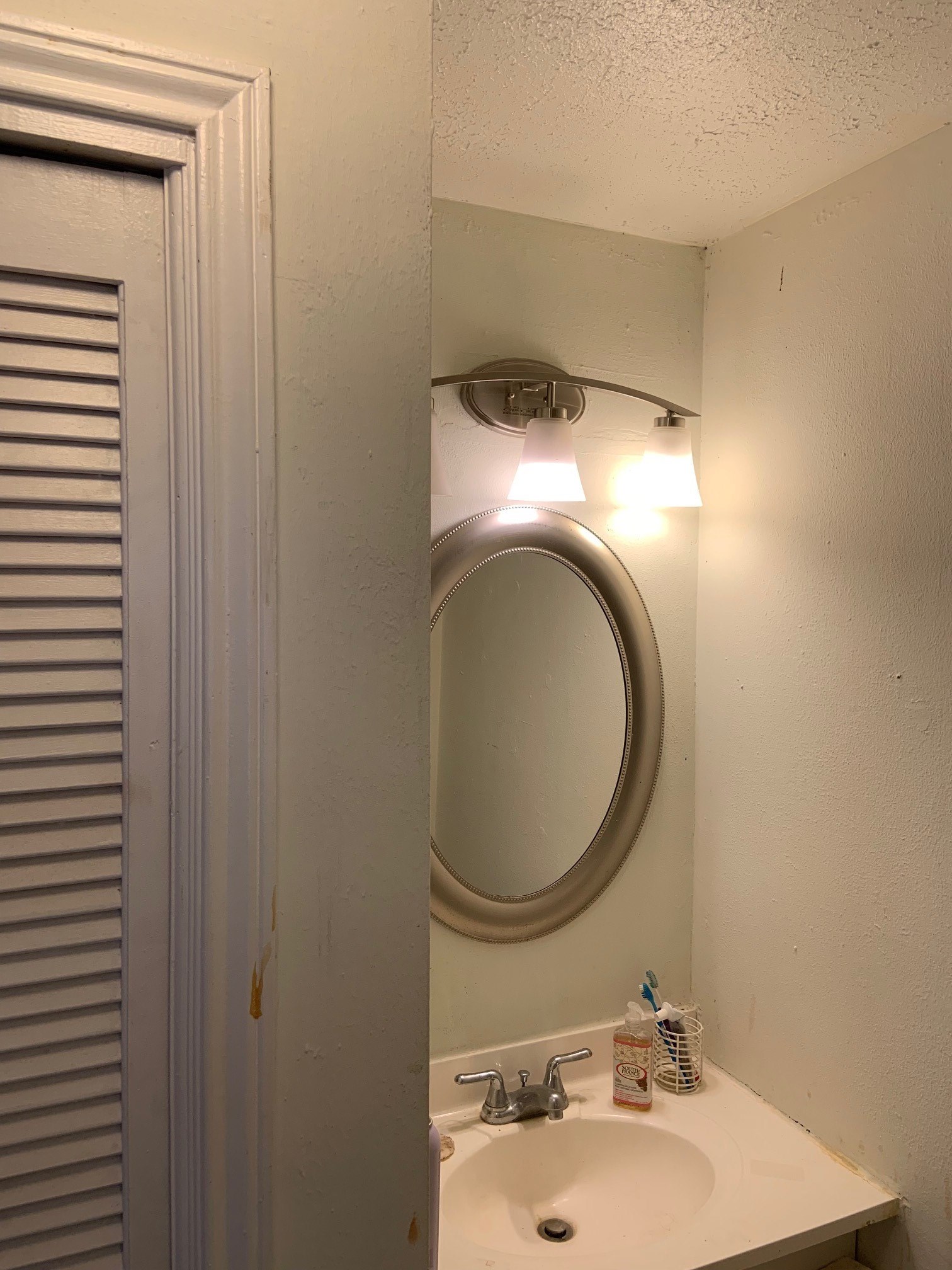 822 Byrne Street, Unit B Houston, TX 77009 - Photo 5 of 11 a bathroom with a sink and a toilet