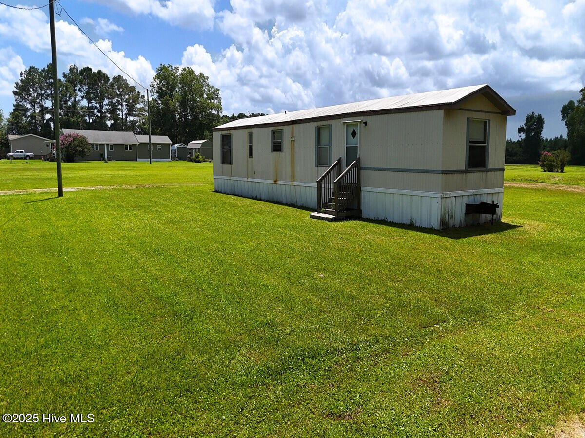 481 Nine Mile Road Maple Hill, NC 28454 - Photo 24 of 43 24. Home Side
