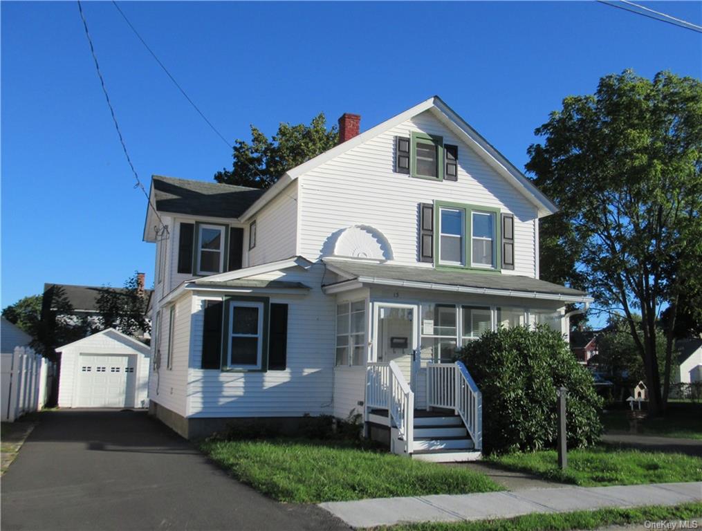 13 Grand Street Port Jervis, NY 12771 - Photo 1 of 33 a front view of a house with a yard