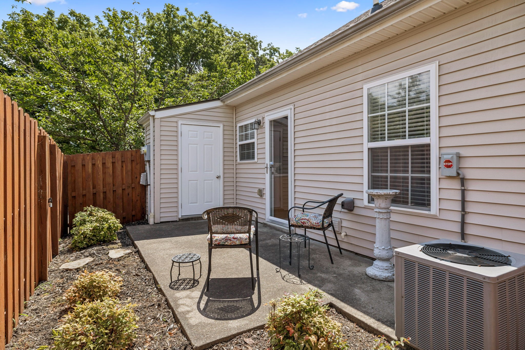 1101 Downs Boulevard, Unit 316 Franklin, TN 37064 - Photo 26 of 26 a view of backyard with a patio and outdoor seating