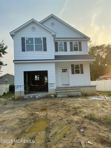 a big house with yard in front of it