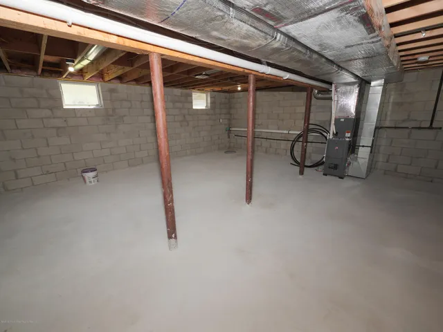 a view of a room with wooden walls