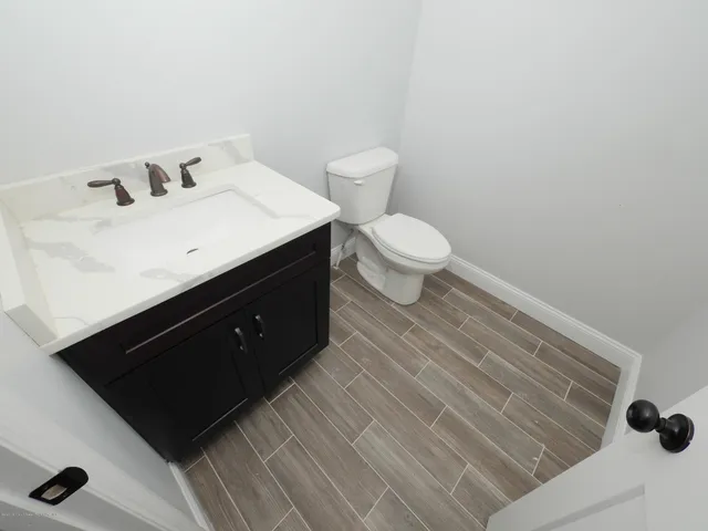 a bathroom with a sink and a toilet