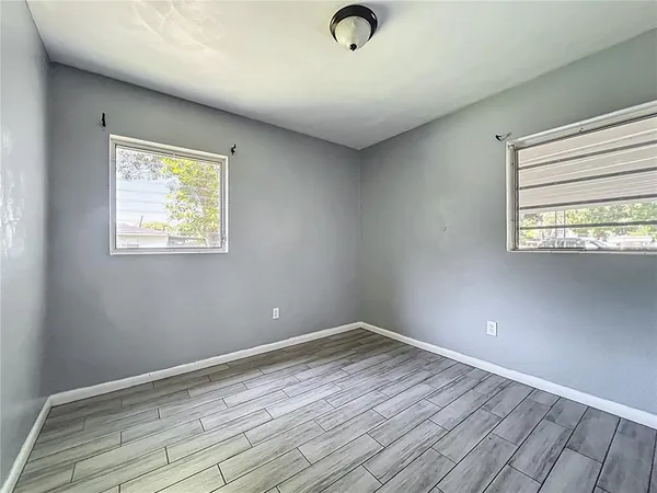 an empty room with windows