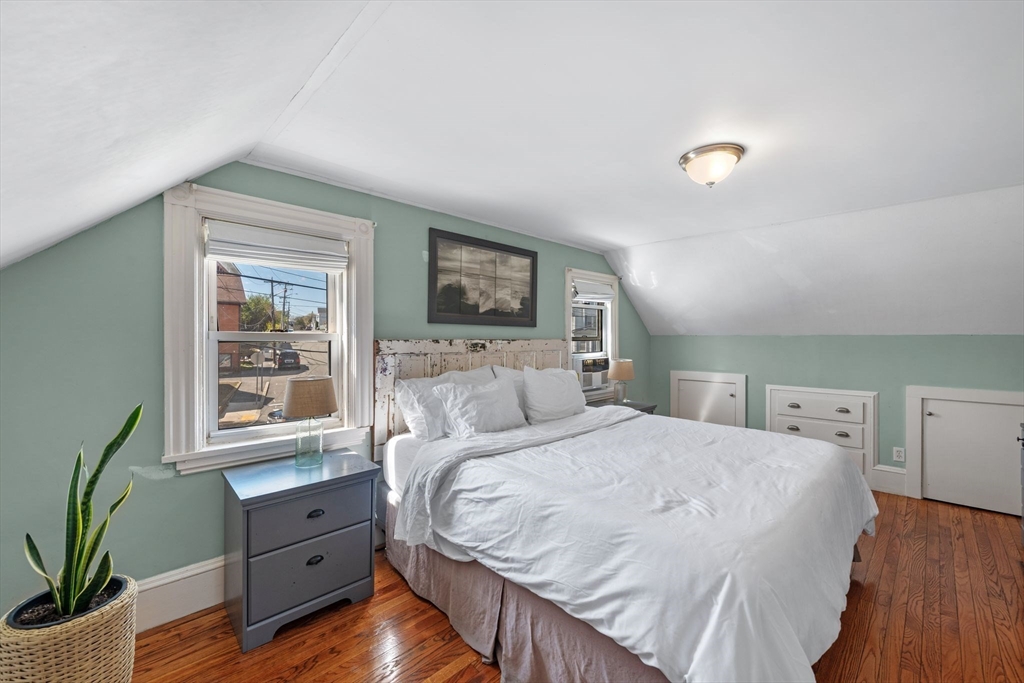 184 North Street Salem, MA 01970 - Photo 27 of 39 a bedroom with a bed and a window