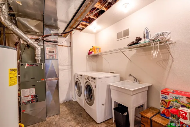 a utility room with dryer and washer