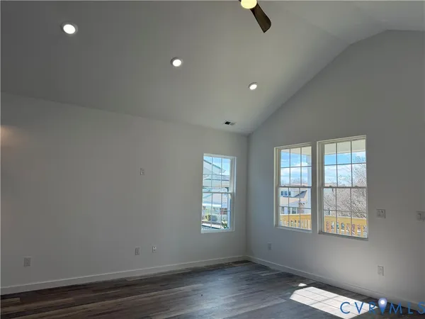 an empty room with windows