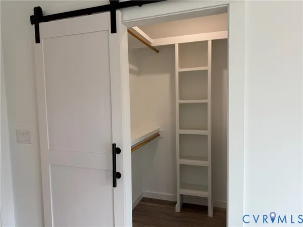 a view of an empty walk in closet