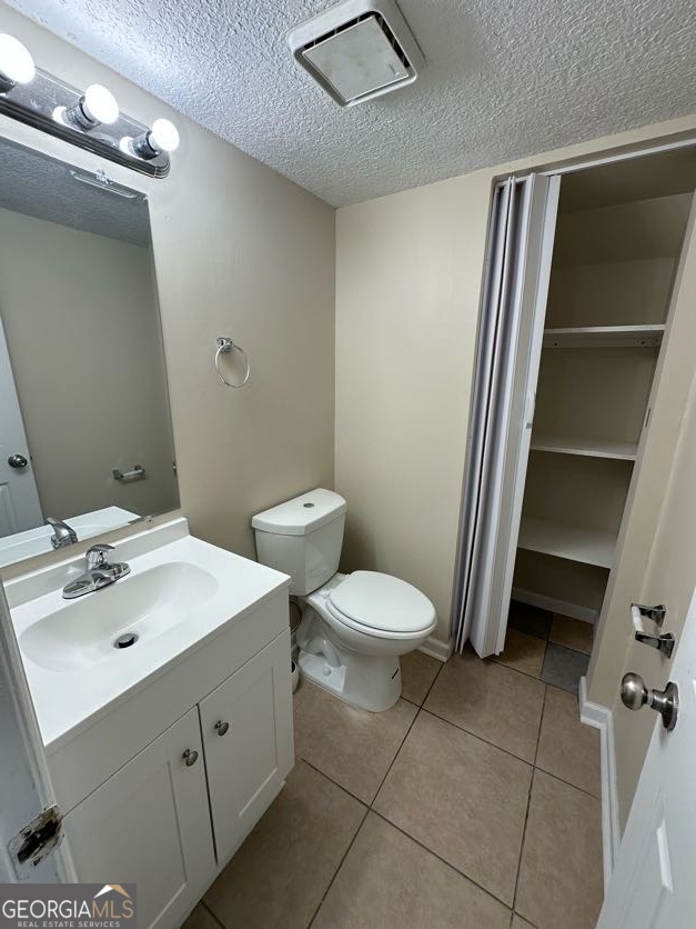 129 Inlet Reach Circle St. Marys, GA 31558 - Photo 7 of 13 a bathroom with a toilet sink and mirror