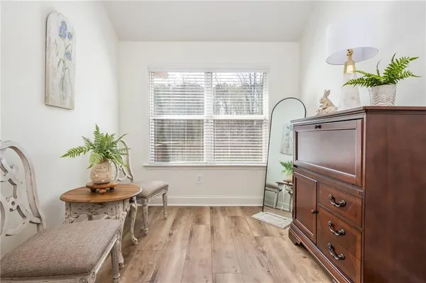 a view of a living room and a window