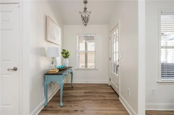 a view of entryway with livingroom