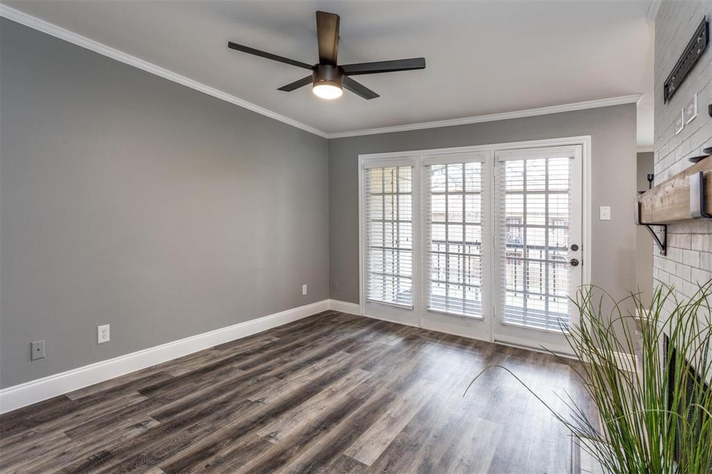 16301 Ledgemont Lane, Unit 283 Addison, TX 75001 - Photo 9 of 16 Access to balcony through French style glass doors.