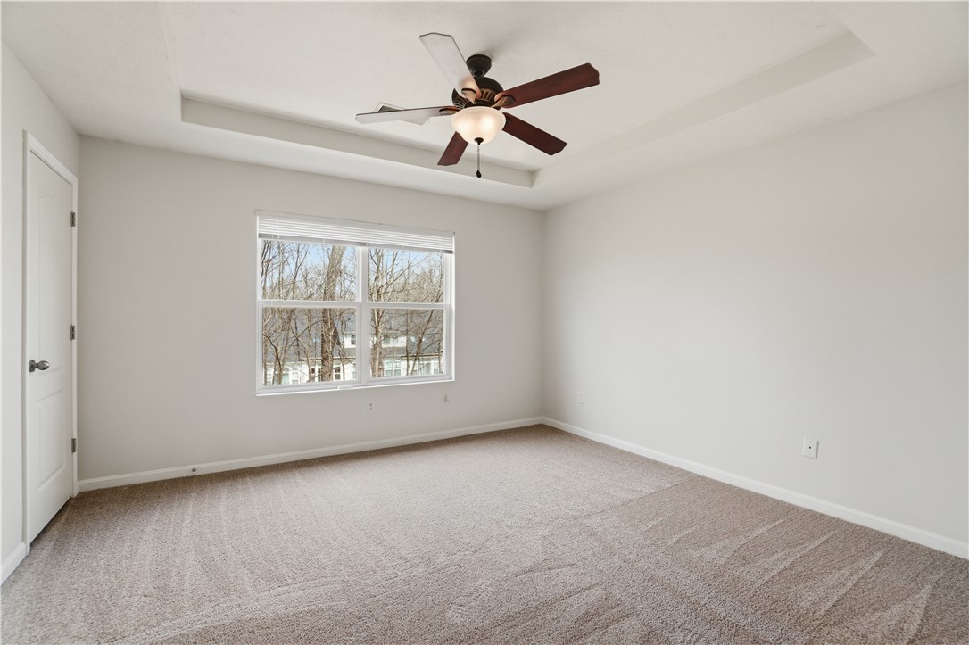 4294 Straight Arrow Road Dayton, OH 45430 - Photo 30 of 41 This spacious bedroom offers ample natural light and a comfortable atmosphere for rest.