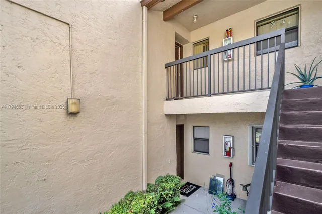 a view of a porch with wooden floor