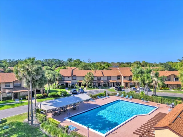 a view of a swimming pool and a terrace