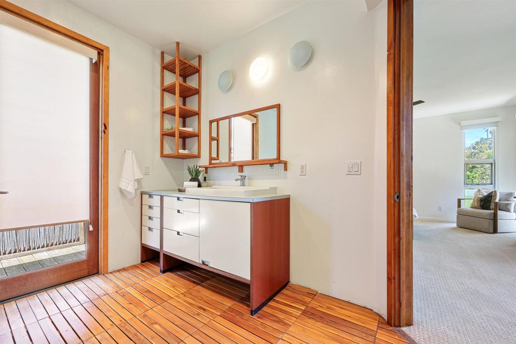 3312 James Drive Carlsbad, CA 92008 - Photo 17 of 41 a bathroom with a sink and a mirror