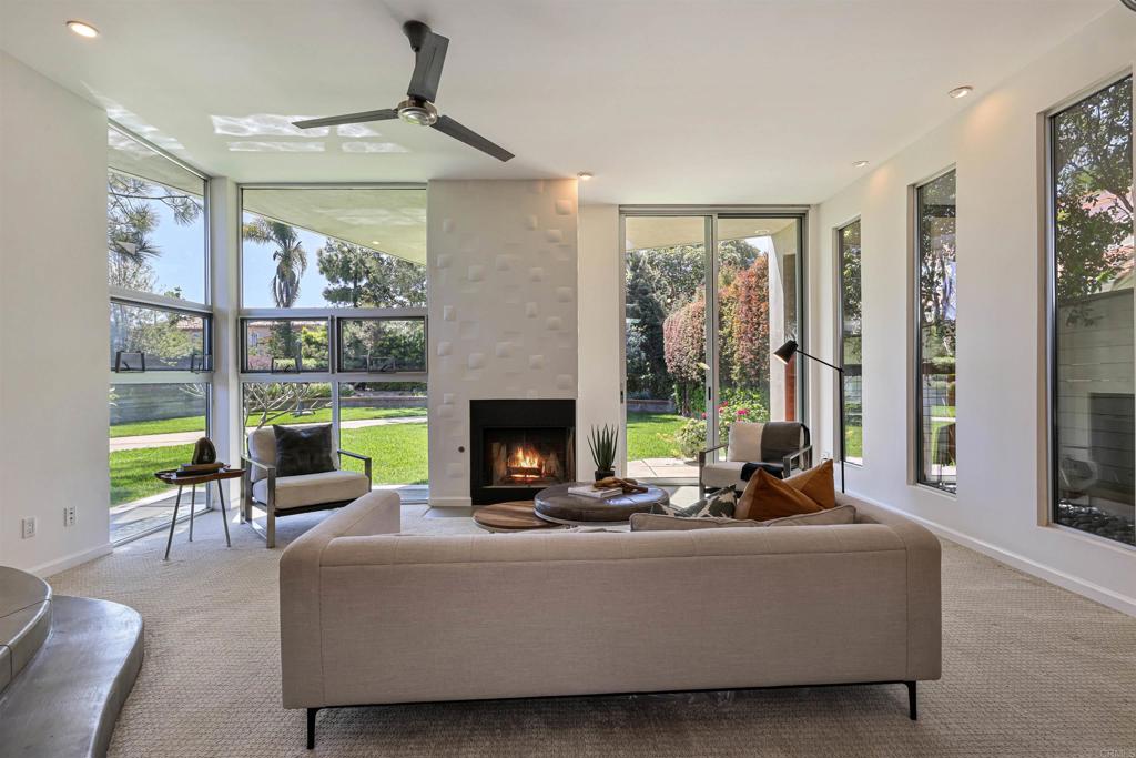 3312 James Drive Carlsbad, CA 92008 - Photo 6 of 41 a living room with furniture and a fireplace