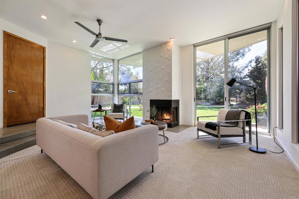 3312 James Drive Carlsbad, CA 92008 - Photo 7 of 41 a living room with furniture and a fireplace
