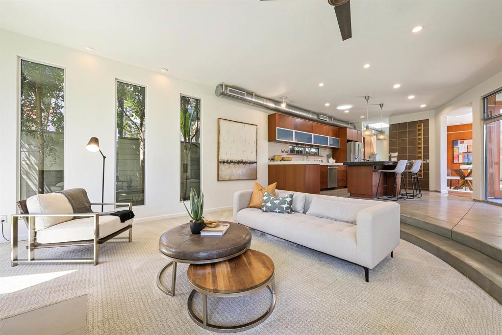 3312 James Drive Carlsbad, CA 92008 - Photo 8 of 41 a living room with furniture and a large window