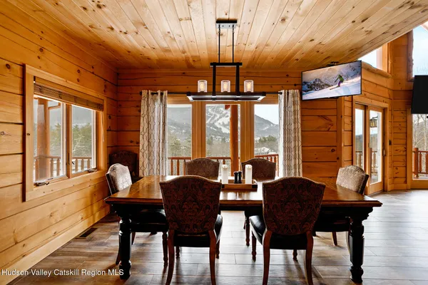 a view of a house with a small yard