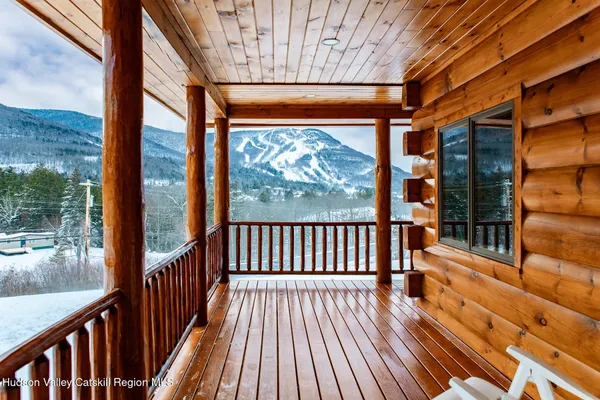 a large kitchen with lots of counter space and glass door