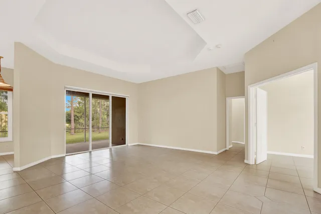 a view of a room with shelf on the wall