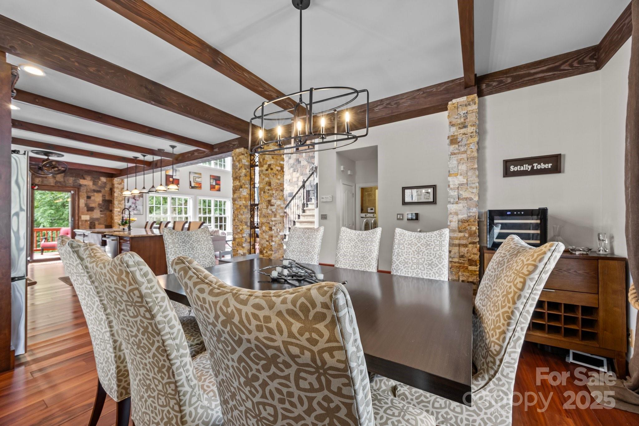 10919 Valley Spring Drive Charlotte, NC 28277 - Photo 11 of 47 a view of a dining room with furniture window and wooden floor