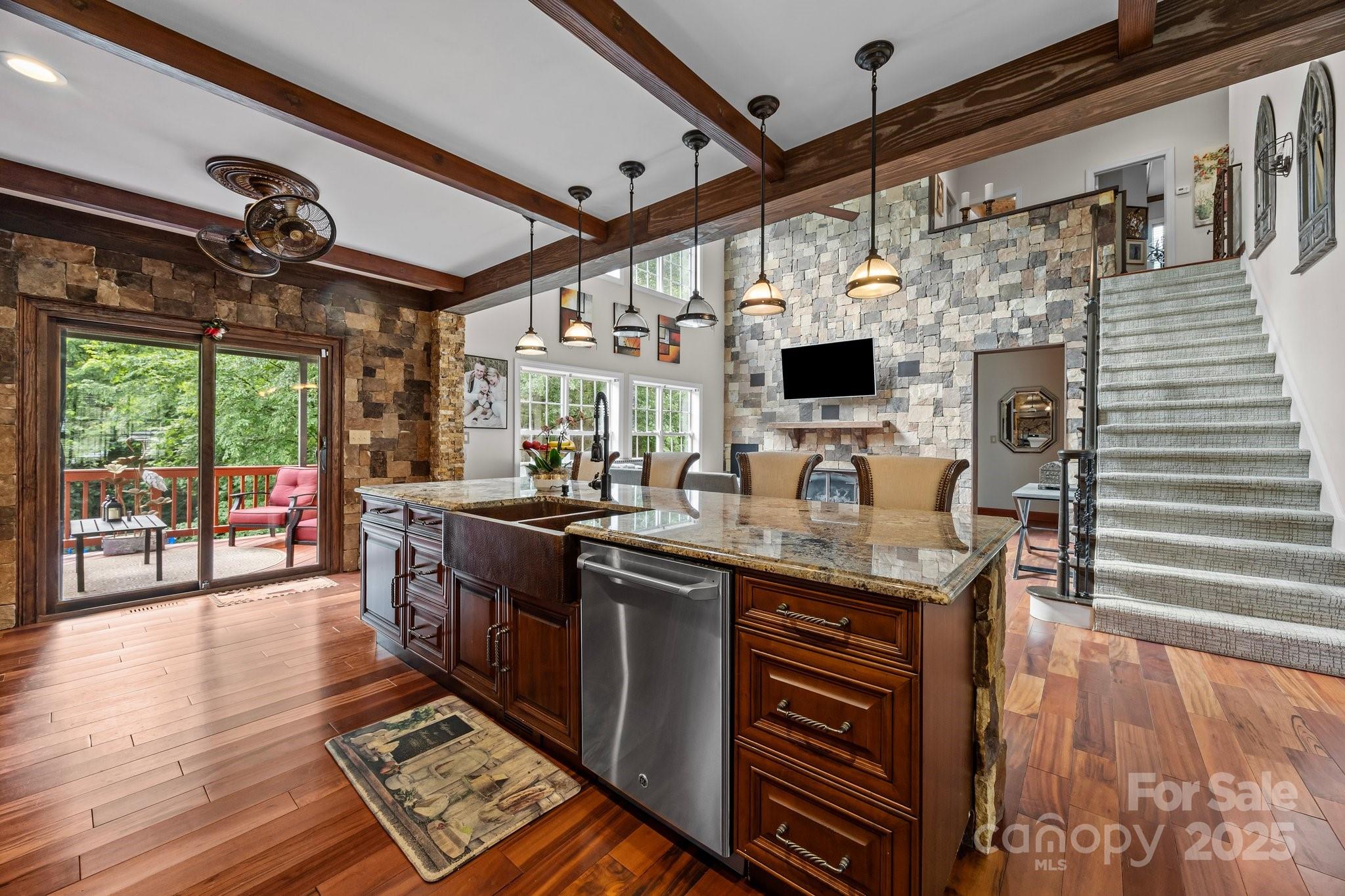 10919 Valley Spring Drive Charlotte, NC 28277 - Photo 14 of 47 a kitchen with stainless steel appliances granite countertop a sink and a stove