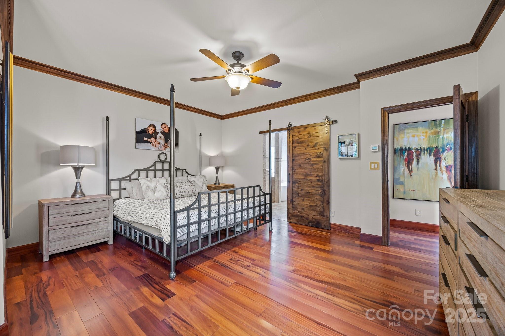 10919 Valley Spring Drive Charlotte, NC 28277 - Photo 19 of 47 a bedroom with furniture and wooden floor