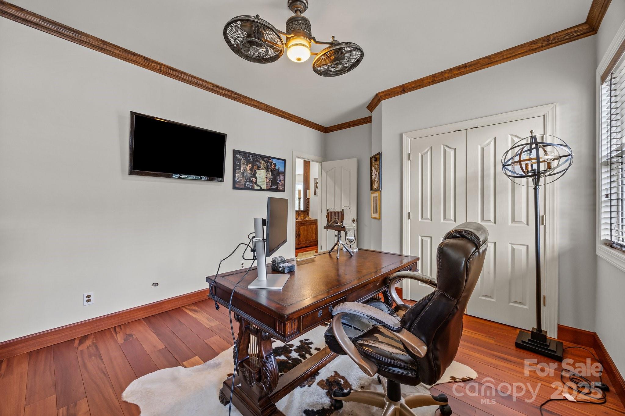 10919 Valley Spring Drive Charlotte, NC 28277 - Photo 32 of 47 a view of a dining room with furniture and wooden floor