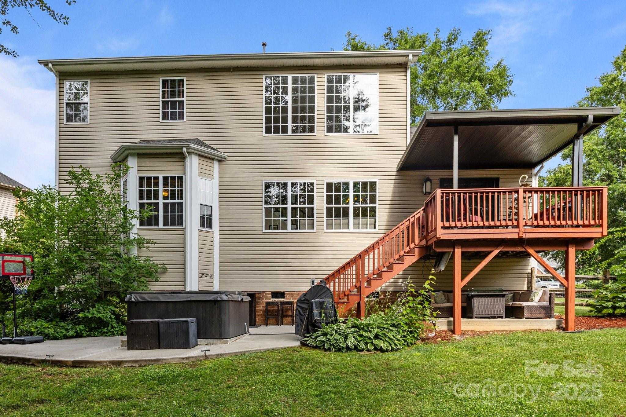 10919 Valley Spring Drive Charlotte, NC 28277 - Photo 37 of 47 a front view of a house with garden