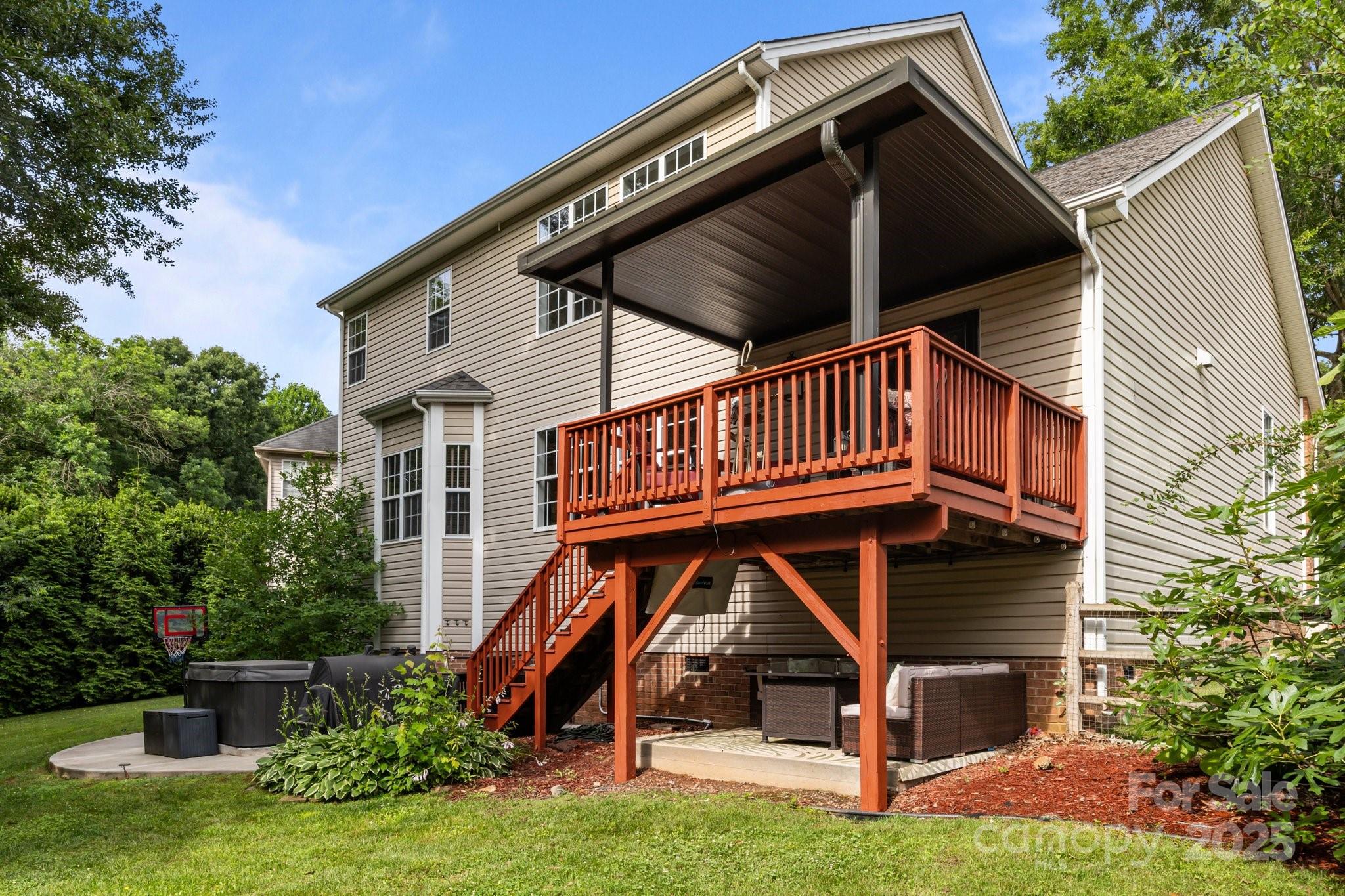 10919 Valley Spring Drive Charlotte, NC 28277 - Photo 39 of 47 a view of small house with yard and furniture