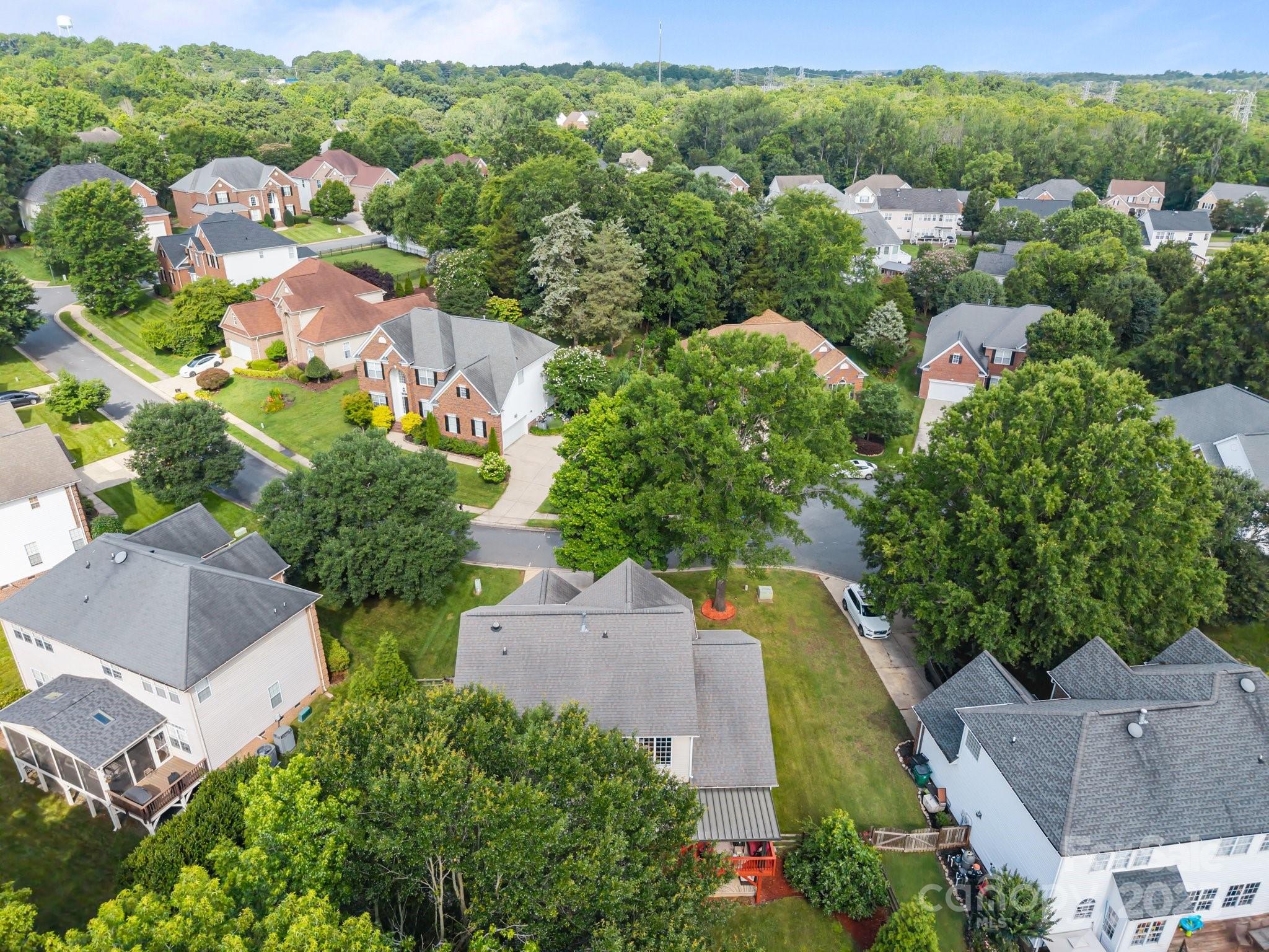 10919 Valley Spring Drive Charlotte, NC 28277 - Photo 45 of 47 an aerial view of residential houses with outdoor space and street view