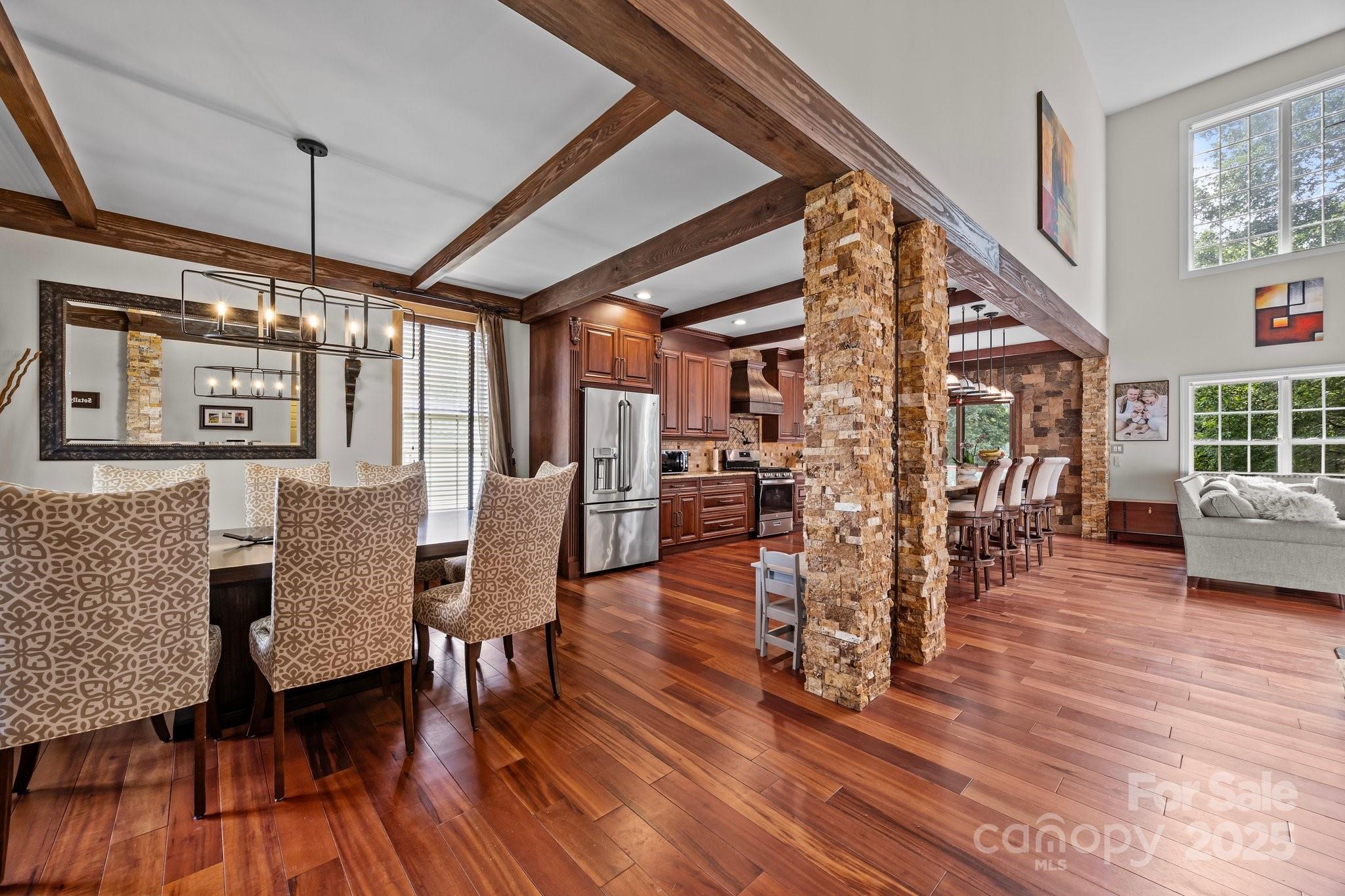 10919 Valley Spring Drive Charlotte, NC 28277 - Photo 6 of 47 a view of a dining room with furniture window and wooden floor