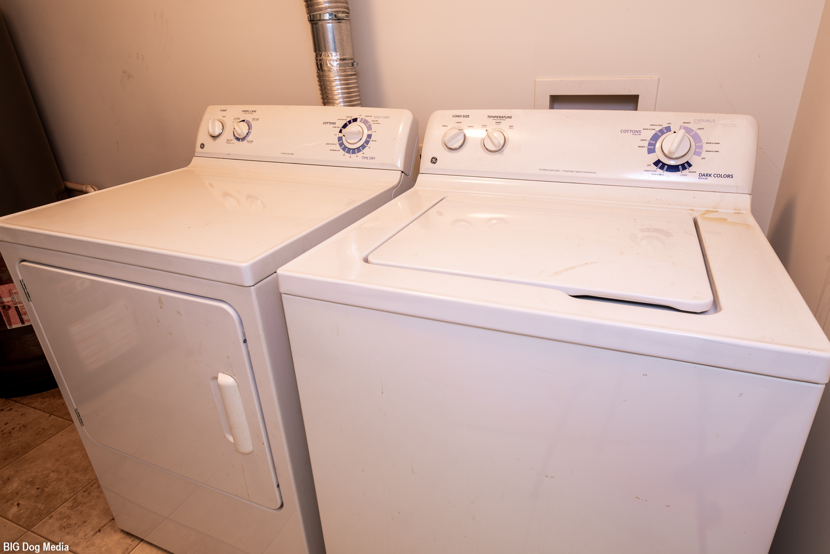 10225 Mulberry Lane, Unit J Bridgeview, IL 60455 - Photo 13 of 24 a utility room with dryer and washer