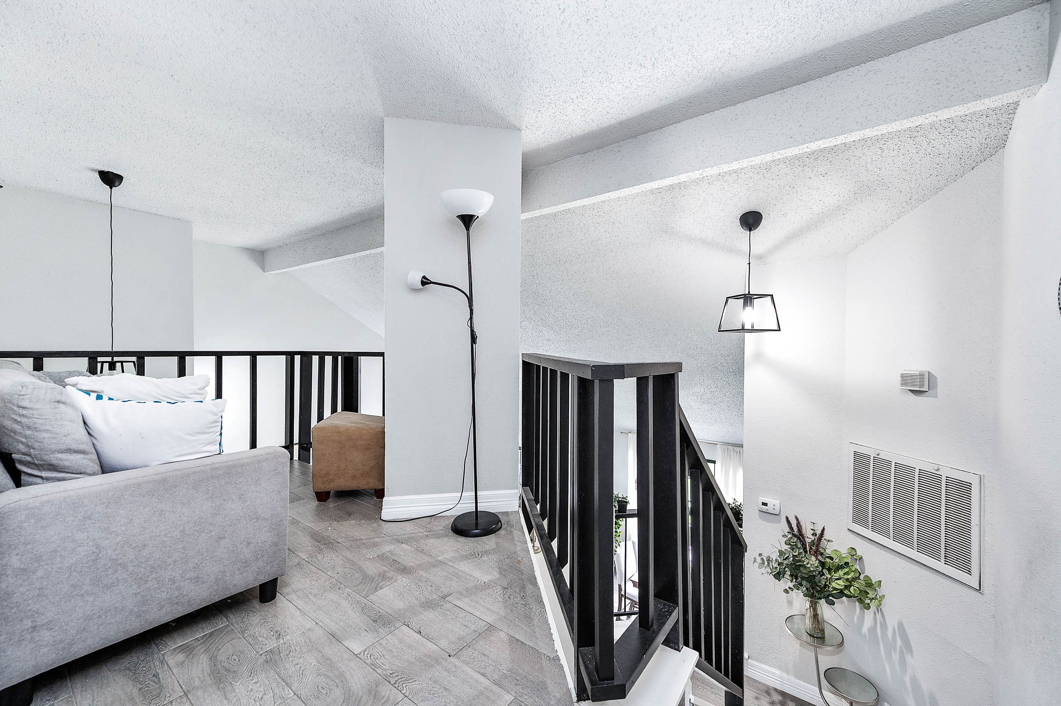 18446 North Willow Bluff Road Katy, TX 77449 - Photo 21 of 31 a living room with furniture and wooden floor