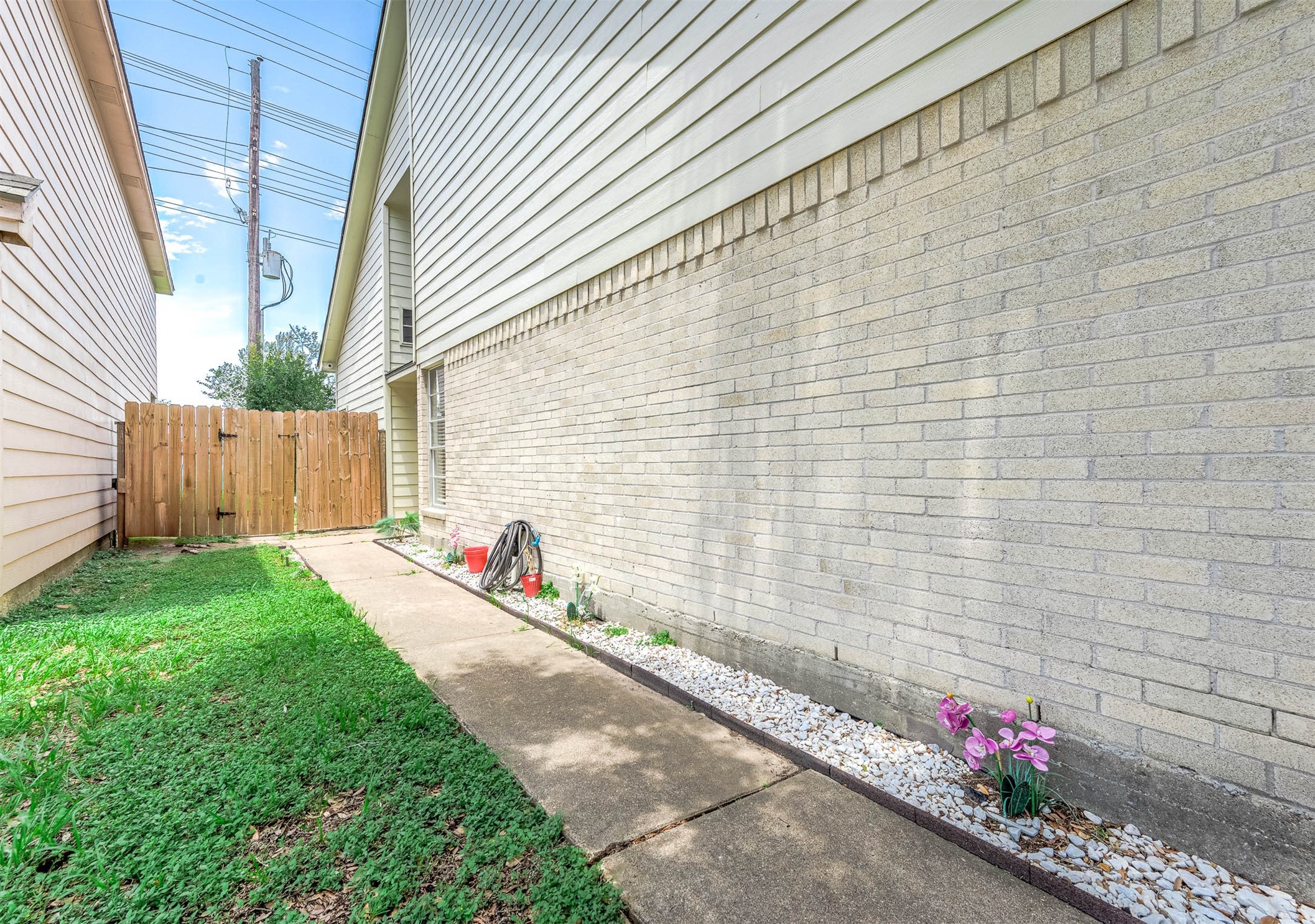 18446 North Willow Bluff Road Katy, TX 77449 - Photo 4 of 31 a view of a pathway with a house