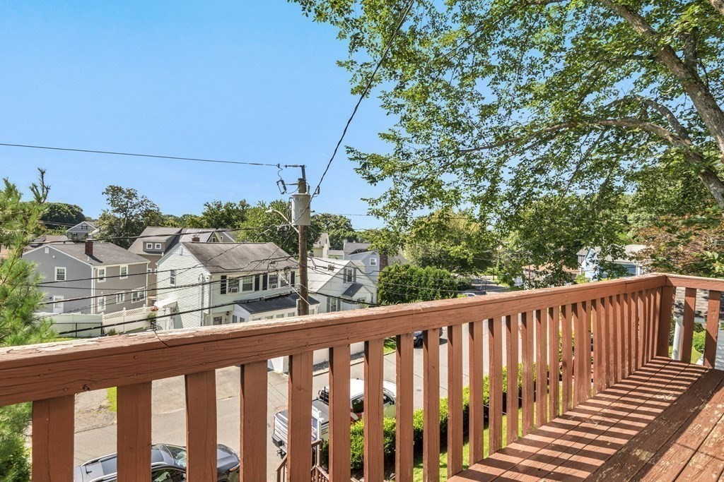 26 Indian Road Waltham, MA 02451 - Photo 3 of 32 a balcony with wooden floor