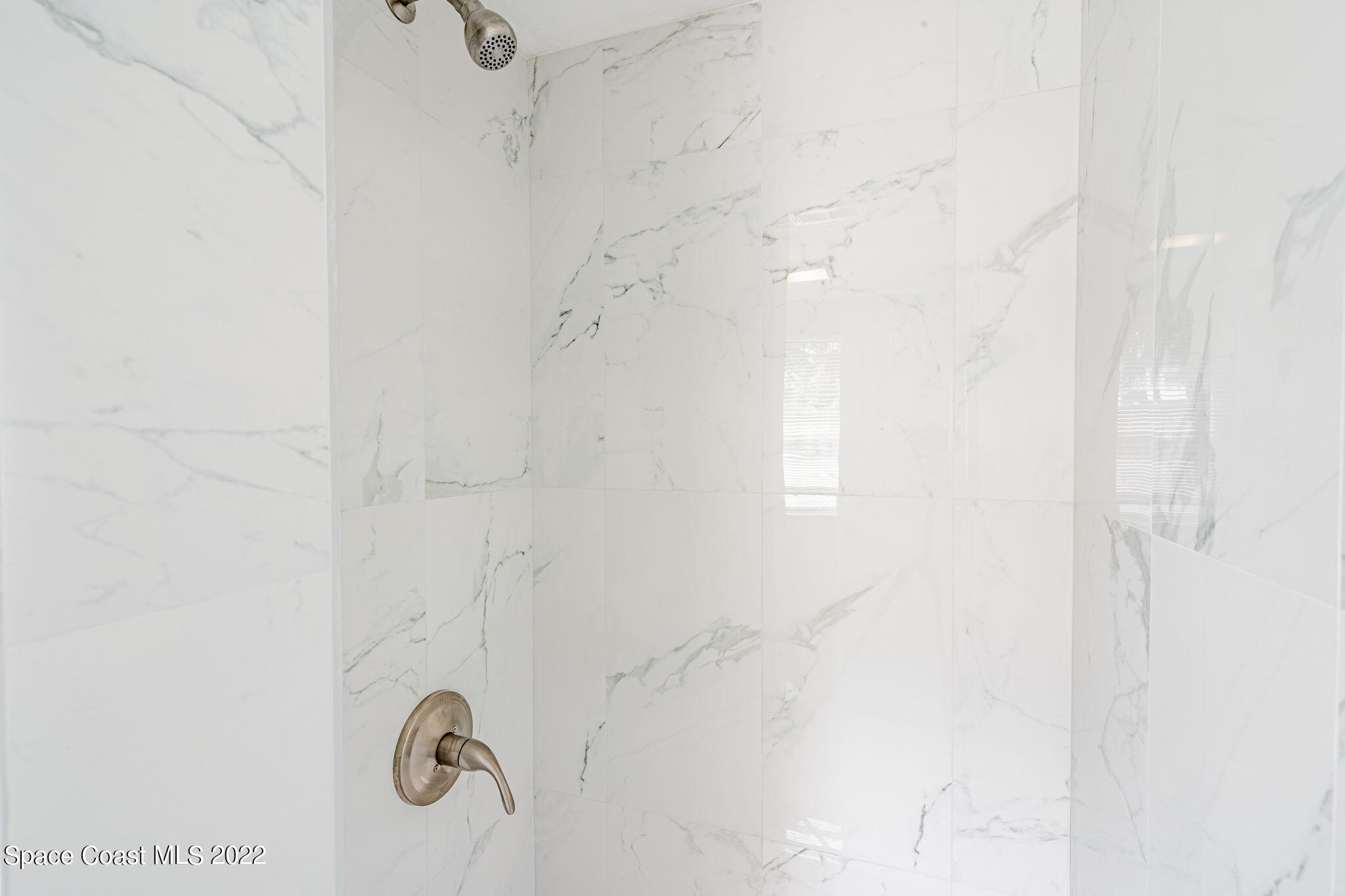 302 Prospect Avenue Cocoa, FL 32922 - Photo 15 of 28 a bathroom with a shower