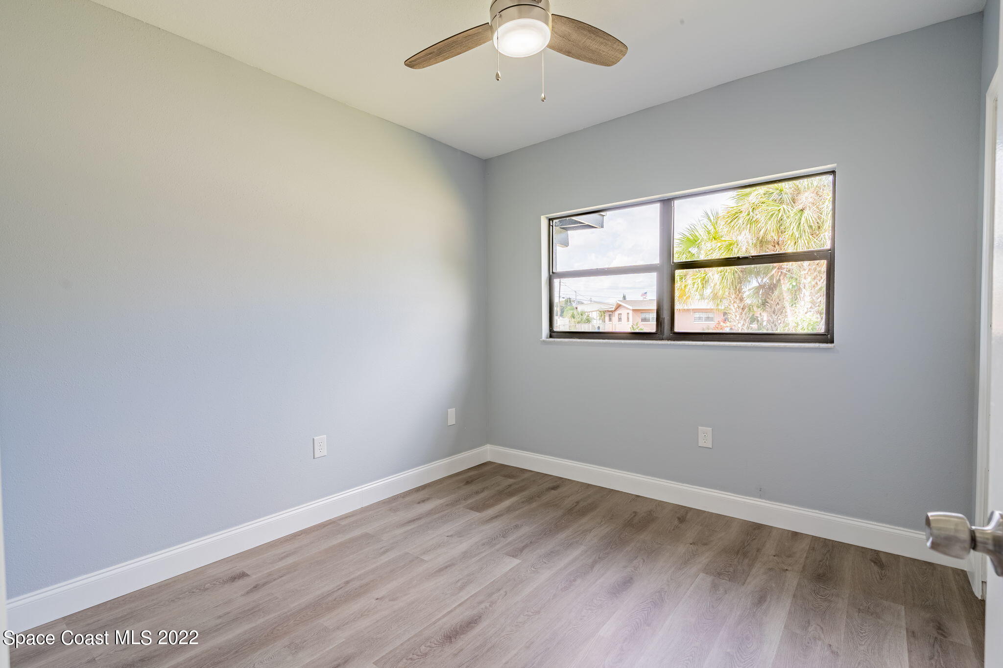 302 Prospect Avenue Cocoa, FL 32922 - Photo 16 of 28 an empty room with a window