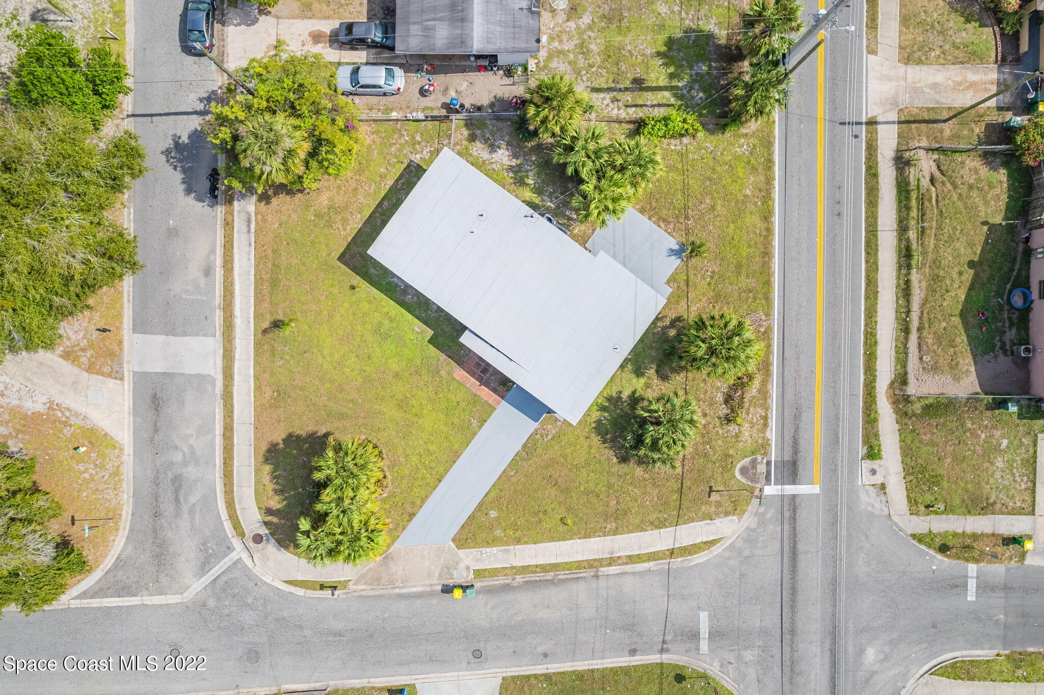 302 Prospect Avenue Cocoa, FL 32922 - Photo 26 of 28 aerial view of a residential houses with trees