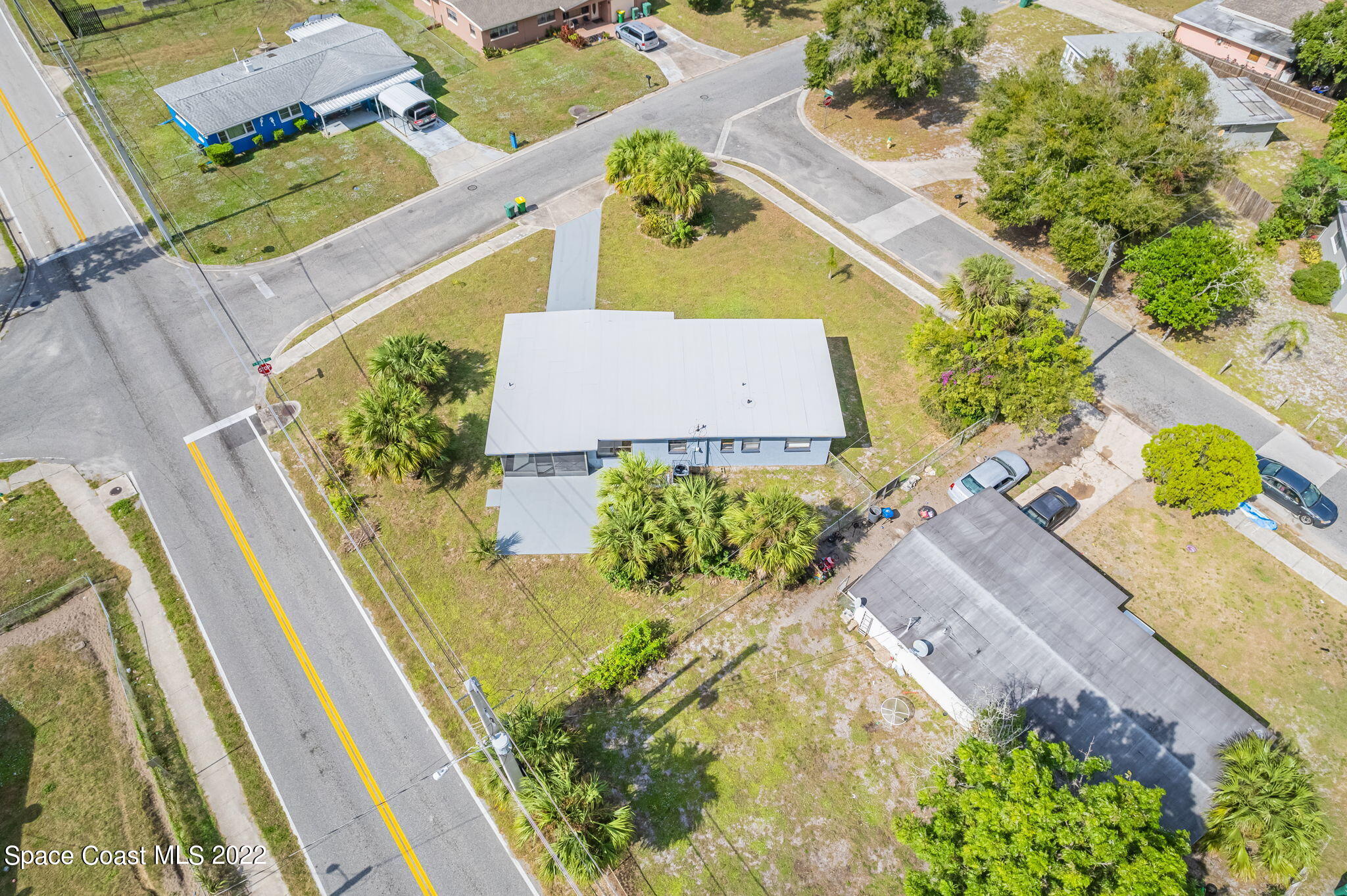 302 Prospect Avenue Cocoa, FL 32922 - Photo 28 of 28 an aerial view of a house with a yard