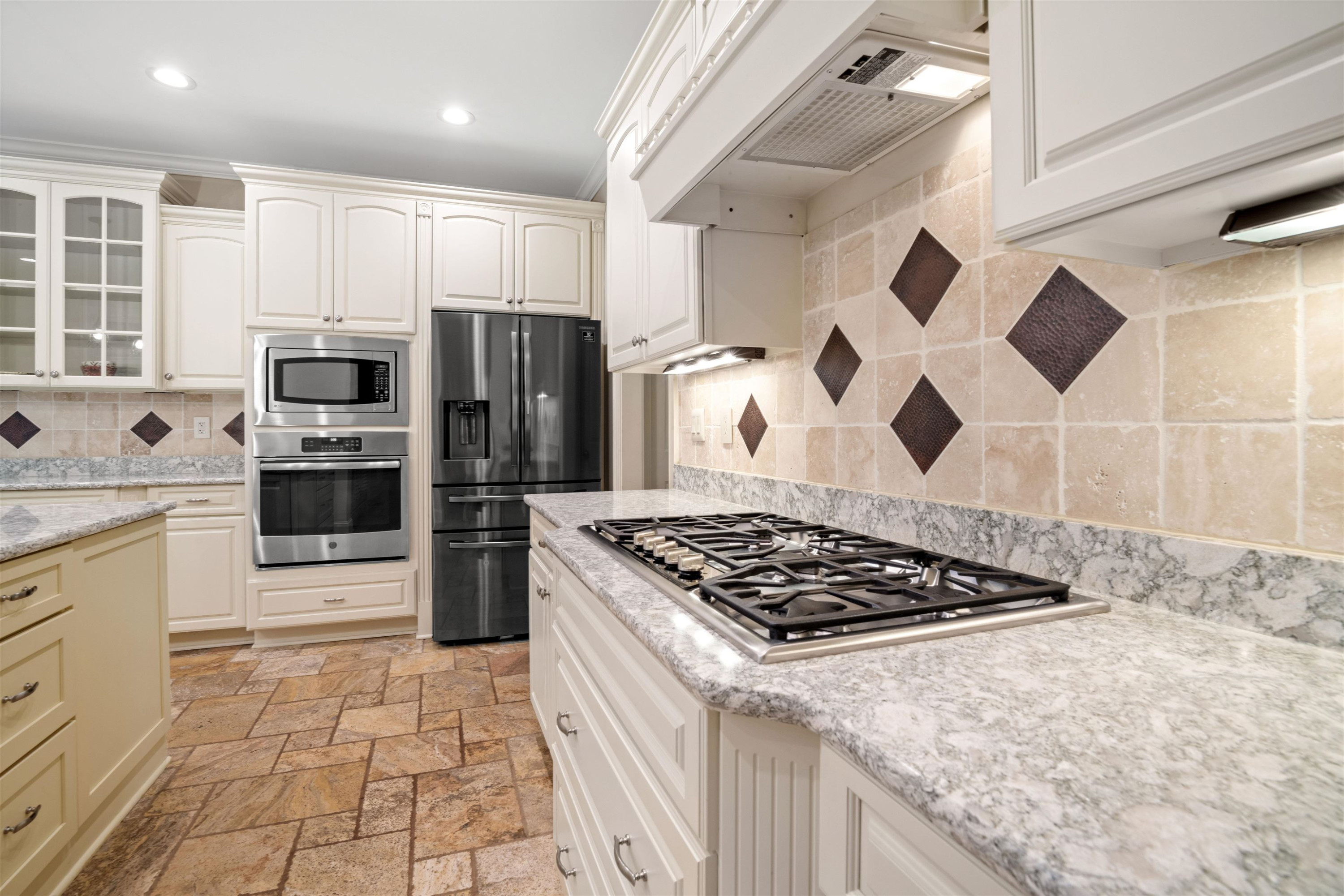 20 Jackson Road Youngsville, NC 27596 - Photo 13 of 41 a kitchen with stainless steel appliances granite countertop a stove and a refrigerator